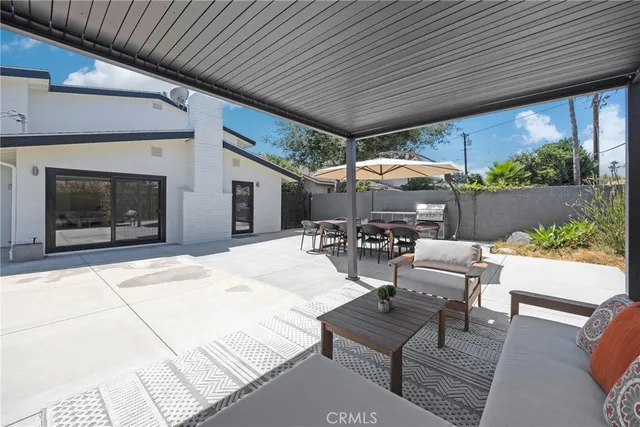 a outdoor space with patio lots of furniture