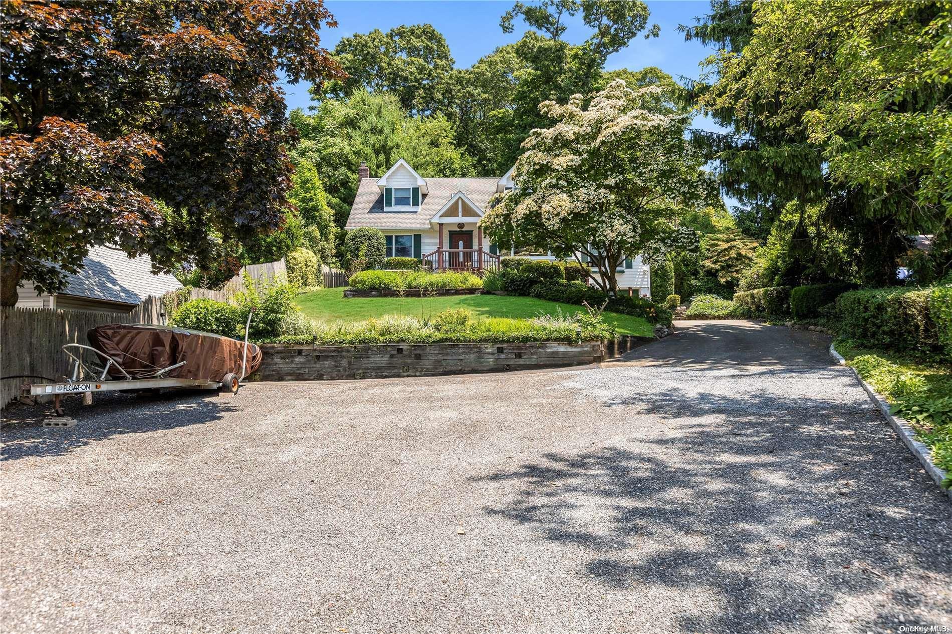 40 Prospect Road Centerport, NY 11721 - Photo 1 of 1 Front of House and long drivwway