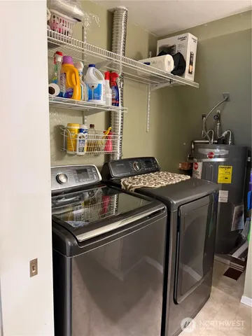 a kitchen with stainless steel appliances granite countertop a sink and a stove