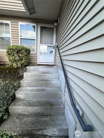 a view of entryway with a front door