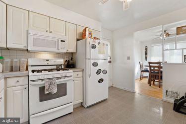2713 Burridge Road Baltimore, MD 21234 - Photo 13 of 20 Kitchen Opens To Dining Room