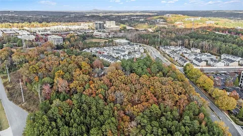 an aerial view of residential building and lake view