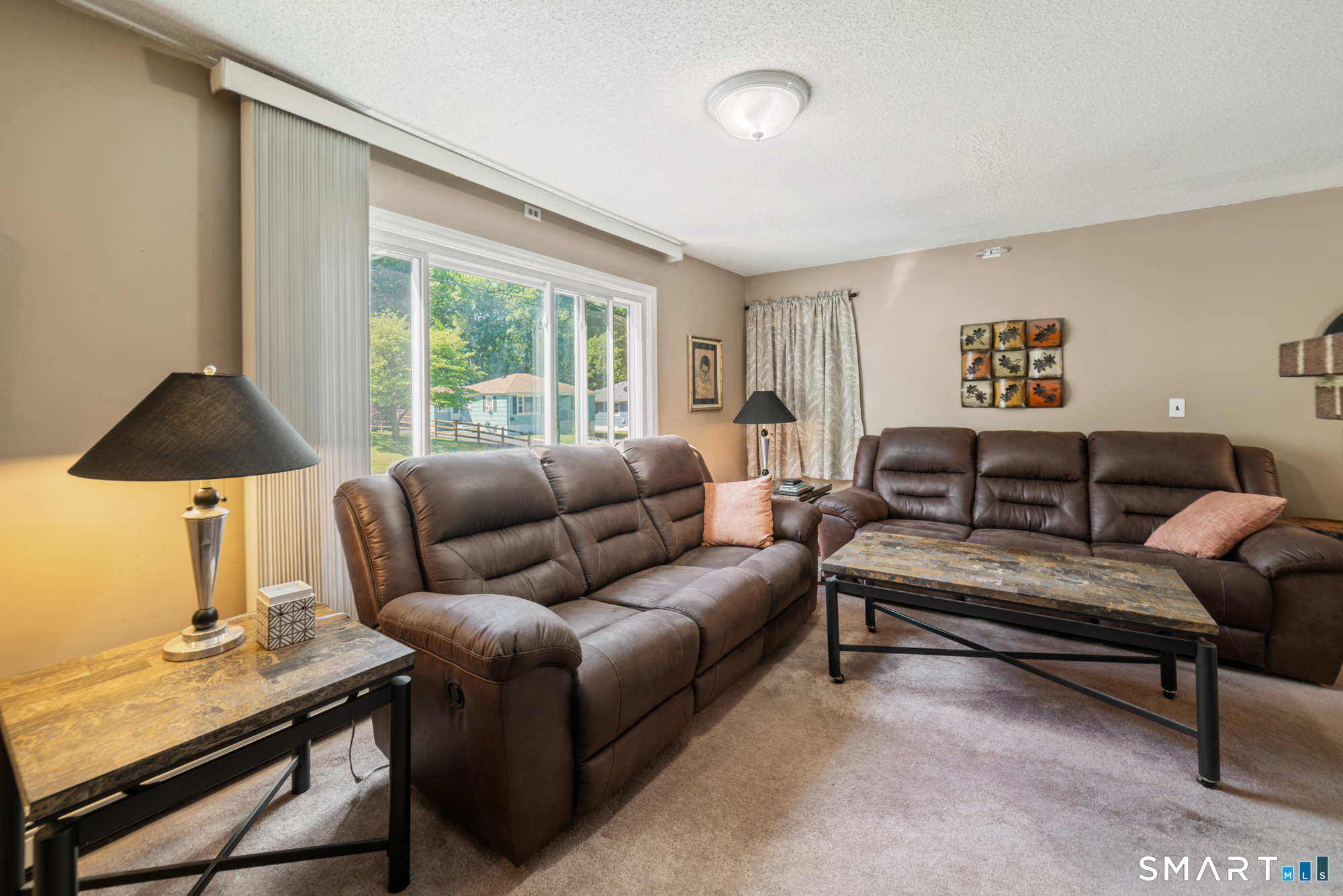 146 Highland Drive Waterbury, CT 06708 - Photo 2 of 31 a living room with furniture and a window