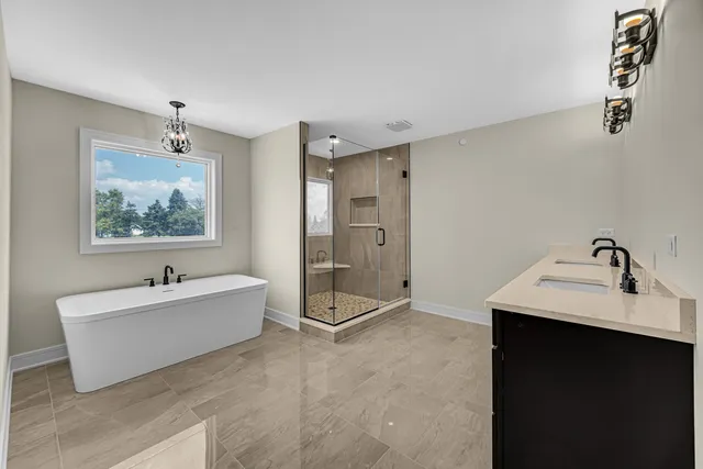 a bathroom with a sink and a bathtub