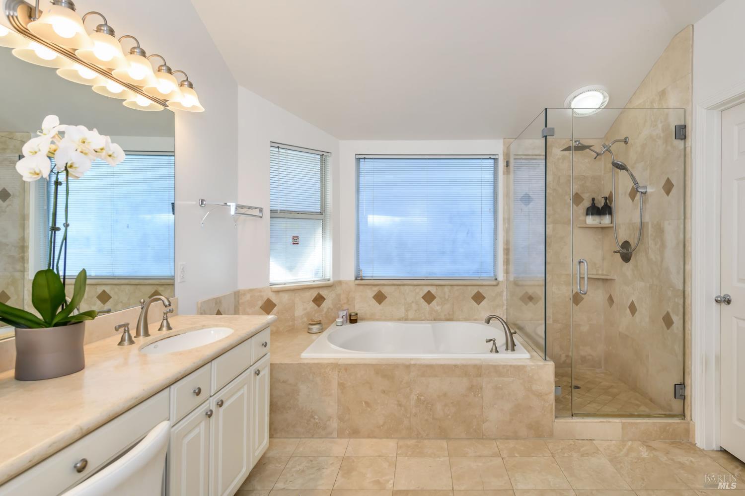 13 Laurel Glen Terrace San Rafael, CA 94903 - Photo 17 of 26 Primary Bathroom with 2 sinks, soaking tub and stall shower