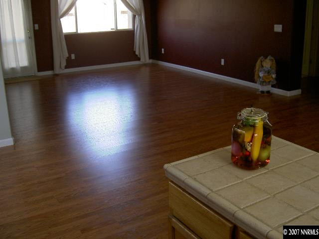 1621 Dutch Ravine Court Reno, NV 89521 - Photo 5 of 9 a kitchen with a sink and wooden floor