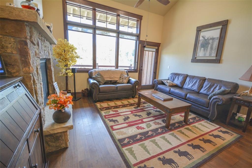 833 Independence Road, Unit 6A Keystone, CO 80435 - Photo 2 of 35 a living room with furniture and a floor to ceiling window