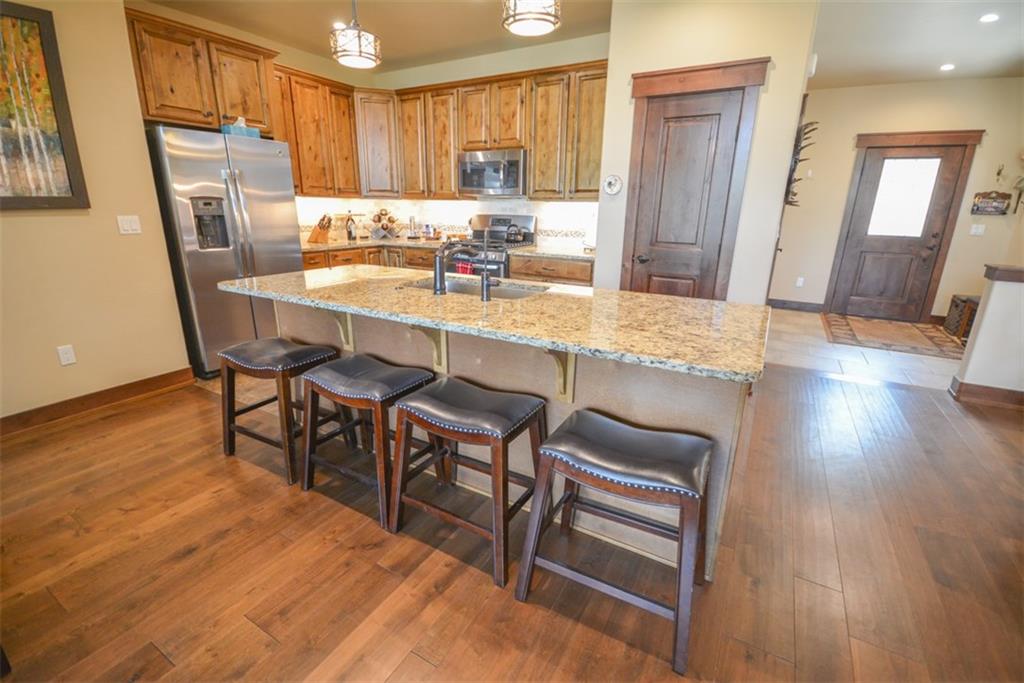 833 Independence Road, Unit 6A Keystone, CO 80435 - Photo 11 of 35 a dining room with furniture and wooden floor