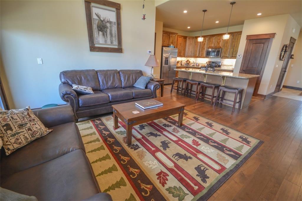 833 Independence Road, Unit 6A Keystone, CO 80435 - Photo 16 of 35 a living room with furniture and a table