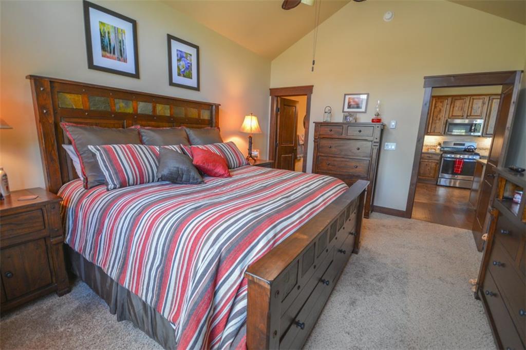 833 Independence Road, Unit 6A Keystone, CO 80435 - Photo 17 of 35 a bedroom with a bed and dresser