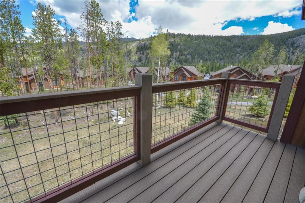 833 Independence Road, Unit 6A Keystone, CO 80435 - Photo 28 of 35 a view of a balcony with wooden floor and fence
