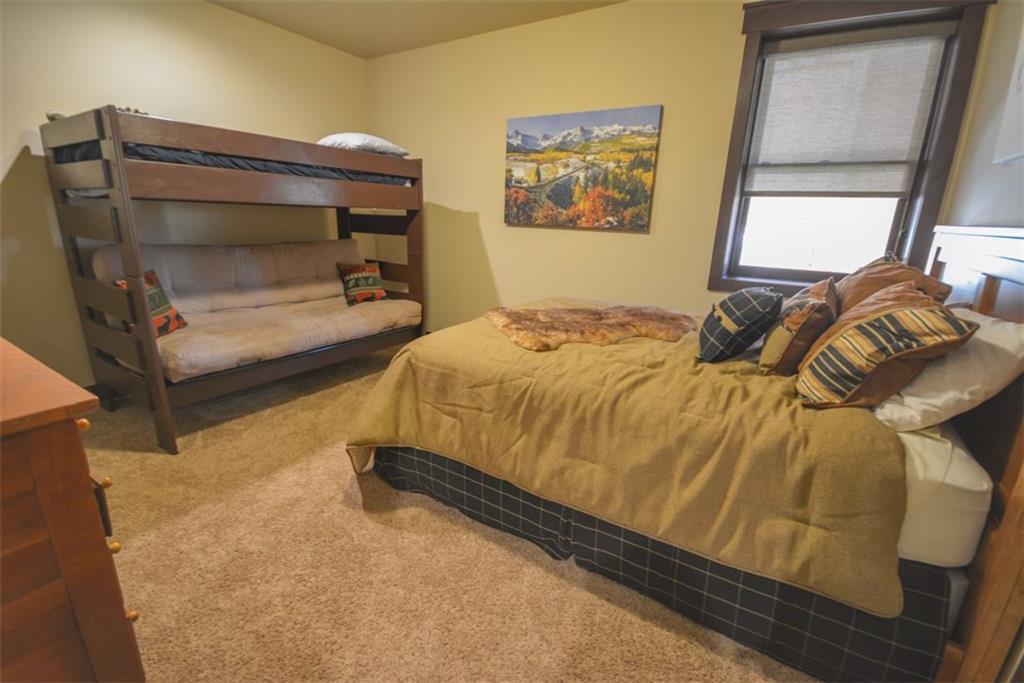 833 Independence Road, Unit 6A Keystone, CO 80435 - Photo 33 of 35 a bedroom with a bed and a window