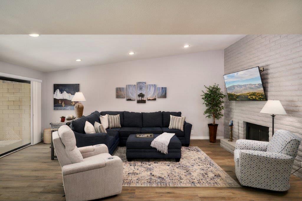 25 Maximo Way Palm Desert, CA 92260 - Photo 11 of 15 a living room with furniture and a fireplace
