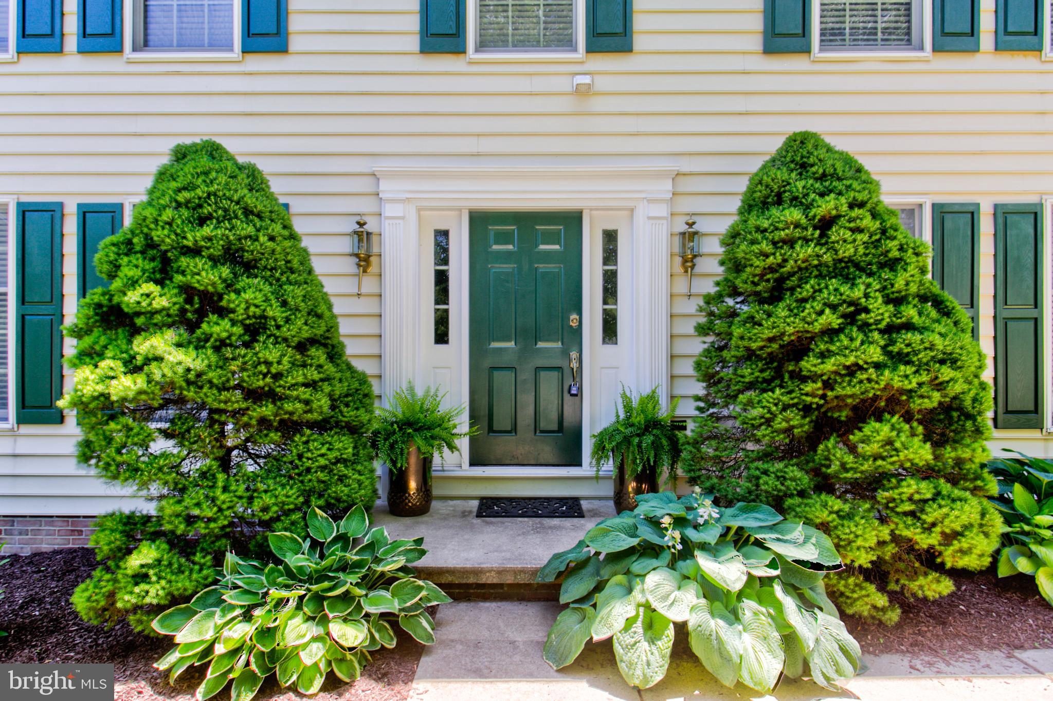 670 Woodside Road York, PA 17406 - Photo 3 of 42 Perennial hostas grace its formal front entry.