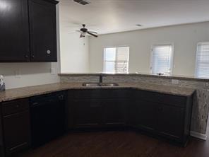 313 Clover Brook Drive Locust Grove, GA 30248 - Photo 8 of 13 a kitchen with granite countertop a sink and cabinets