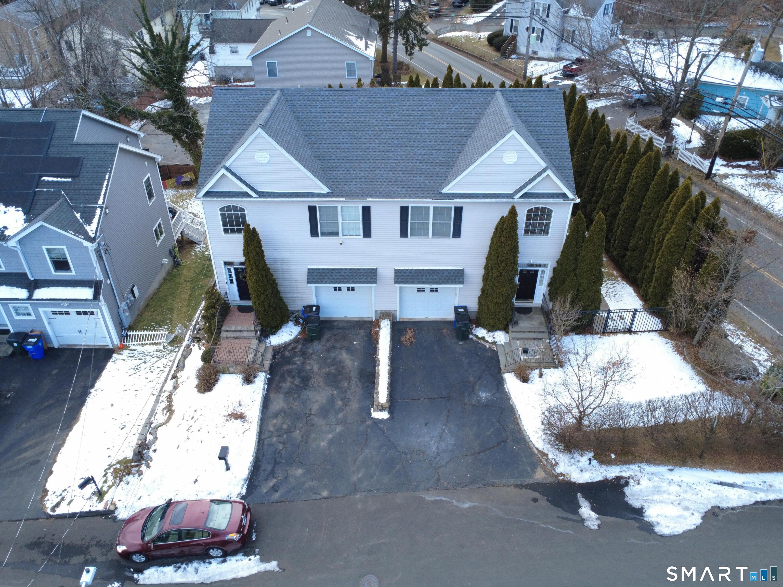 65 Benton Street, Unit 65 Fairfield, CT 06825 - Photo 2 of 35 a house view with sitting space