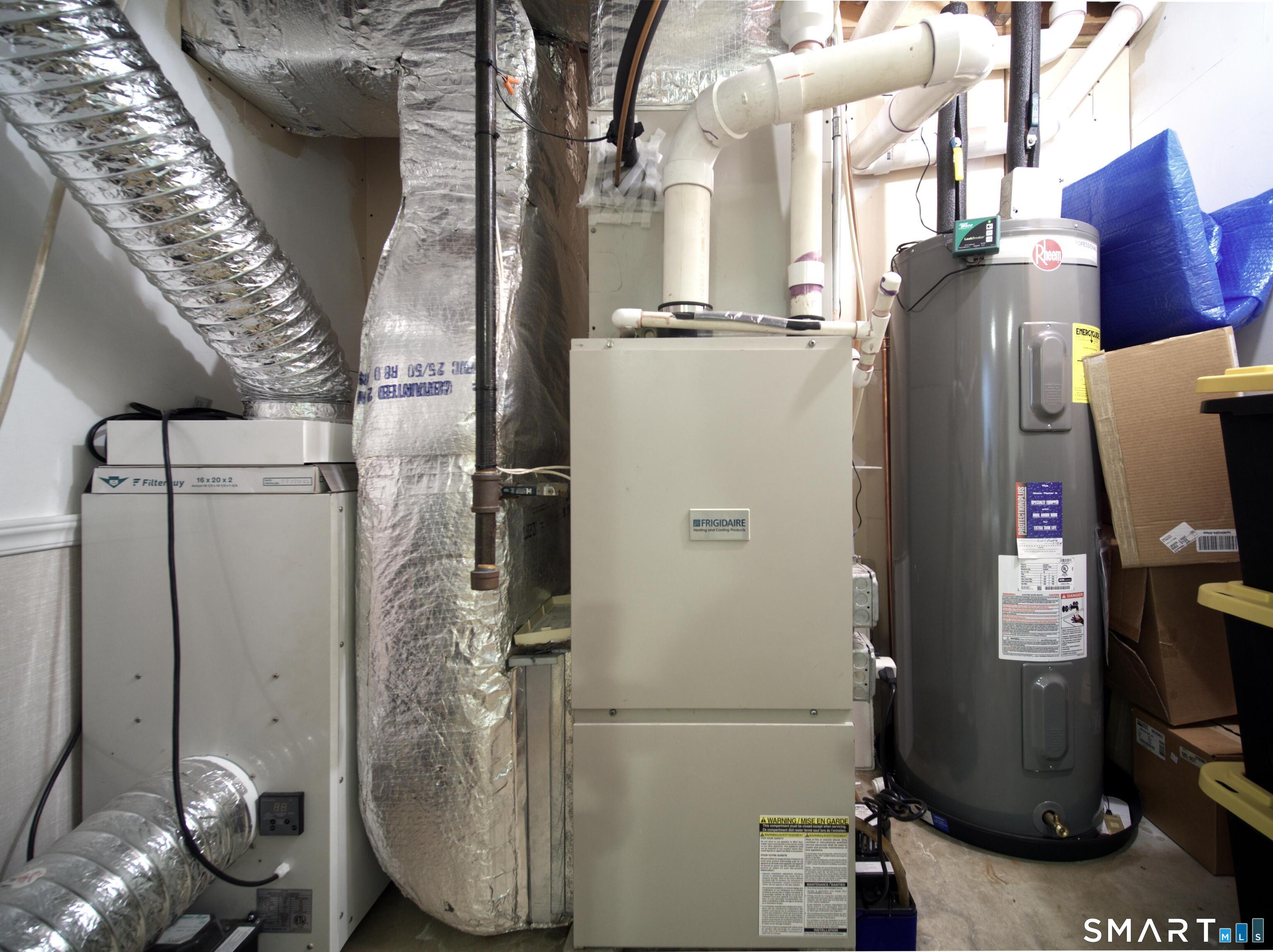 65 Benton Street, Unit 65 Fairfield, CT 06825 - Photo 32 of 35 a view of water heater room