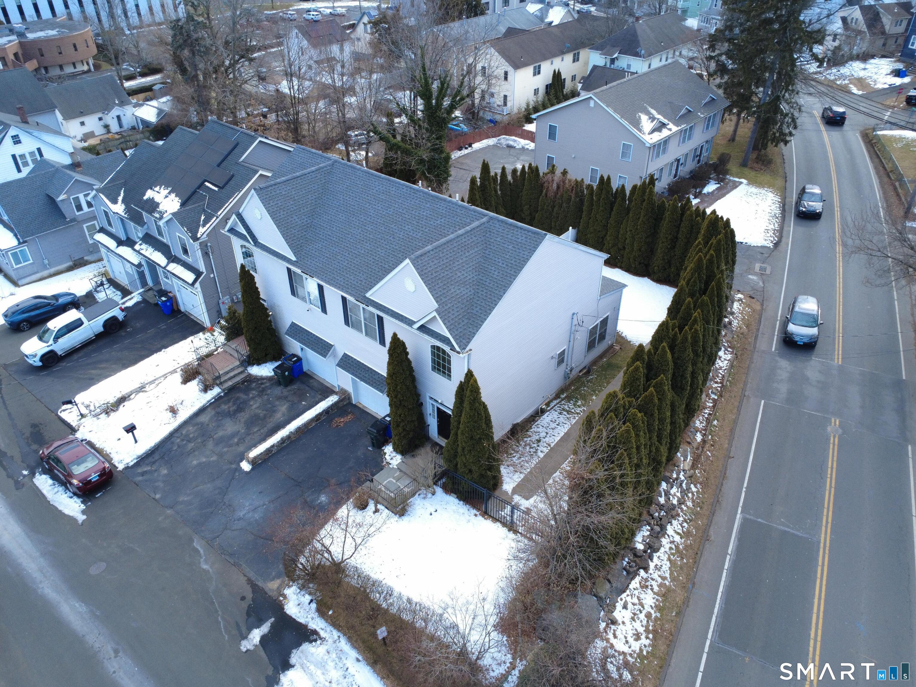 65 Benton Street, Unit 65 Fairfield, CT 06825 - Photo 4 of 35 an aerial view of a house