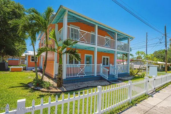 front view of a house with a small yard