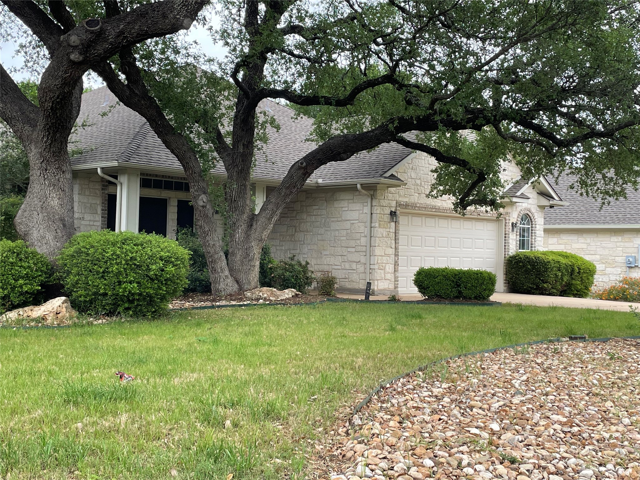 120 Brazos Drive Georgetown, TX 78628 - Photo 14 of 33 a front view of a house with a yard