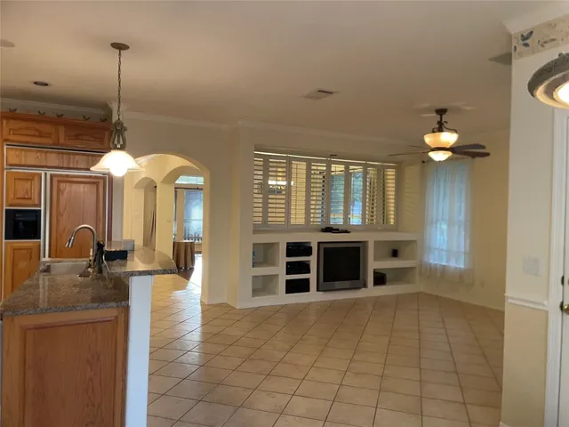 a view of a livingroom with furniture and chandelier