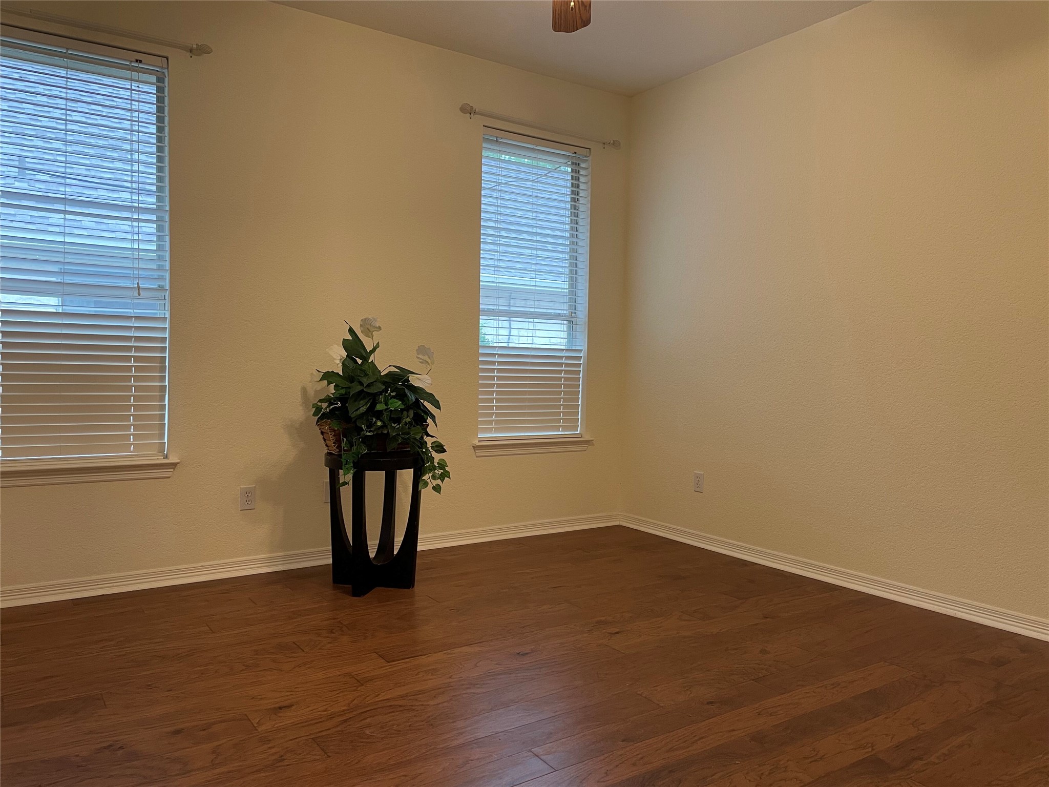120 Brazos Drive Georgetown, TX 78628 - Photo 26 of 33 a view of a room with a wooden floor and a window