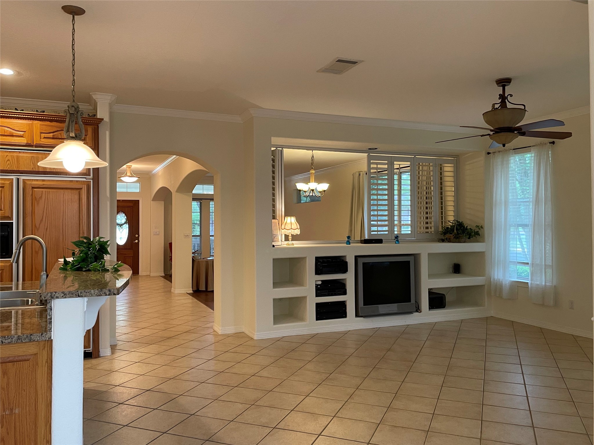 120 Brazos Drive Georgetown, TX 78628 - Photo 6 of 33 a view of a kitchen with a sink and a fireplace