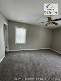 a view of wooden floor and trees