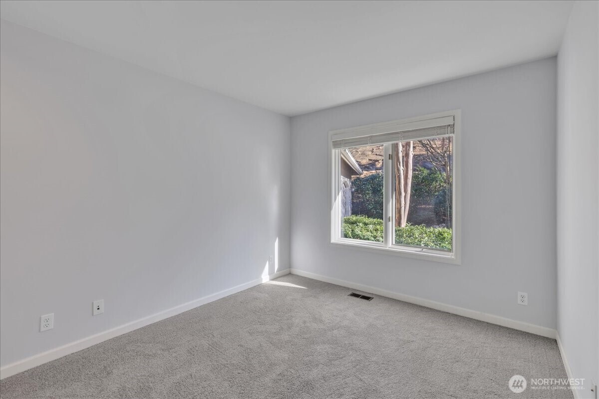 7929 Cyrus Place Edmonds, WA 98026 - Photo 15 of 34 an empty room with windows
