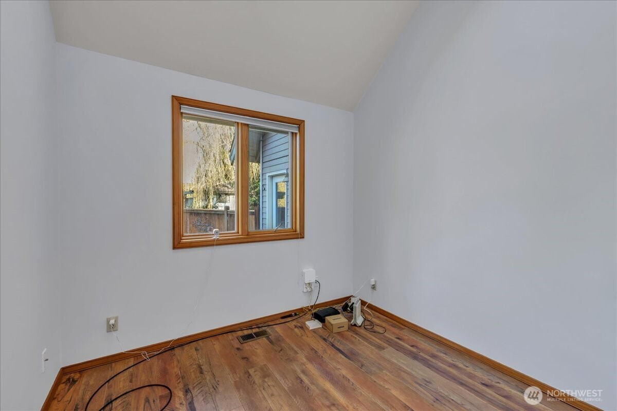 7929 Cyrus Place Edmonds, WA 98026 - Photo 17 of 34 a view of an empty room with a window