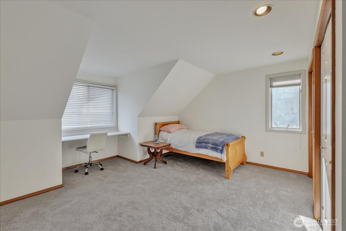 7929 Cyrus Place Edmonds, WA 98026 - Photo 24 of 34 a living room with furniture and a window