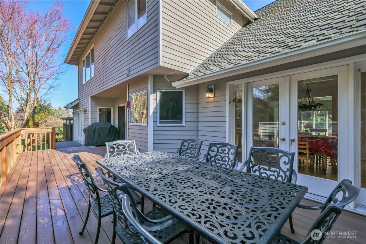 7929 Cyrus Place Edmonds, WA 98026 - Photo 28 of 34 a view of a house with backyard and sitting area