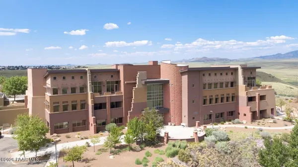 a view of a building with a street