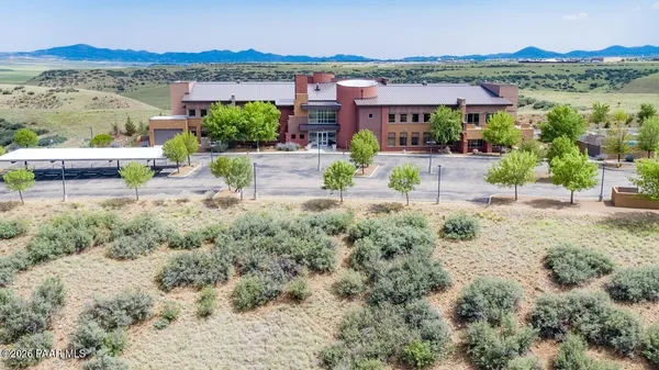 a view of a garden with an outdoor space