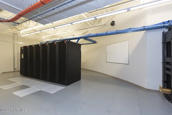 a view of a building with couches