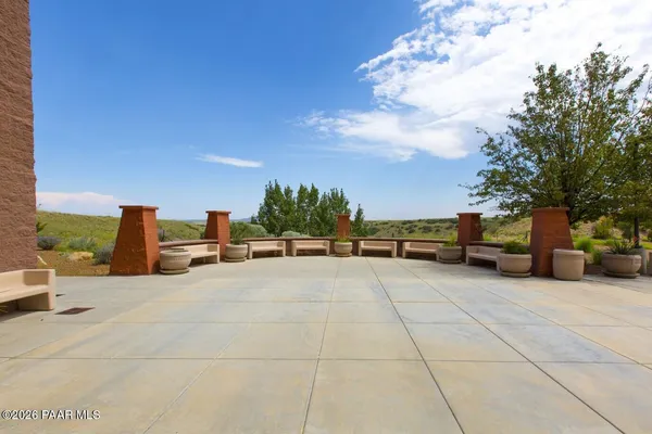 a view of a terrace with chairs