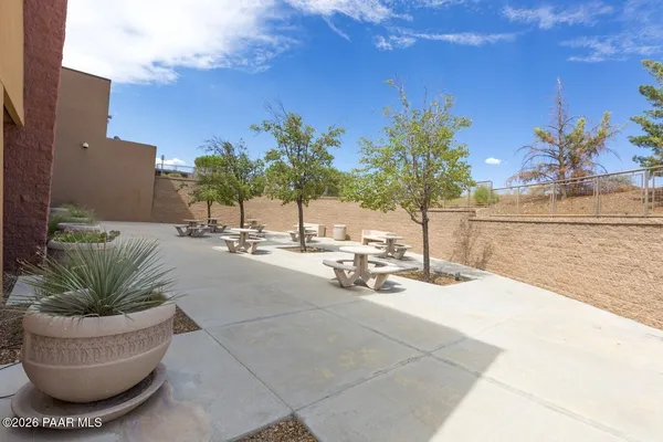 a view of a swimming pool with a yard