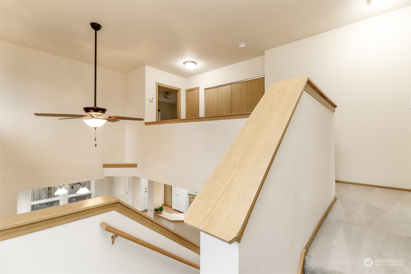 4566 Beckonridge Loop Southeast Lacey, WA 98513 - Photo 17 of 37 a view of a hallway with workspace