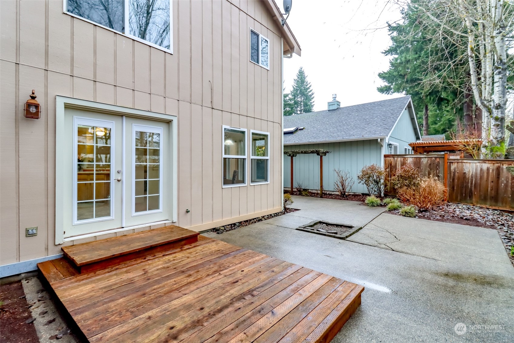 4566 Beckonridge Loop Southeast Lacey, WA 98513 - Photo 30 of 37 a view of a house with backyard and sitting area
