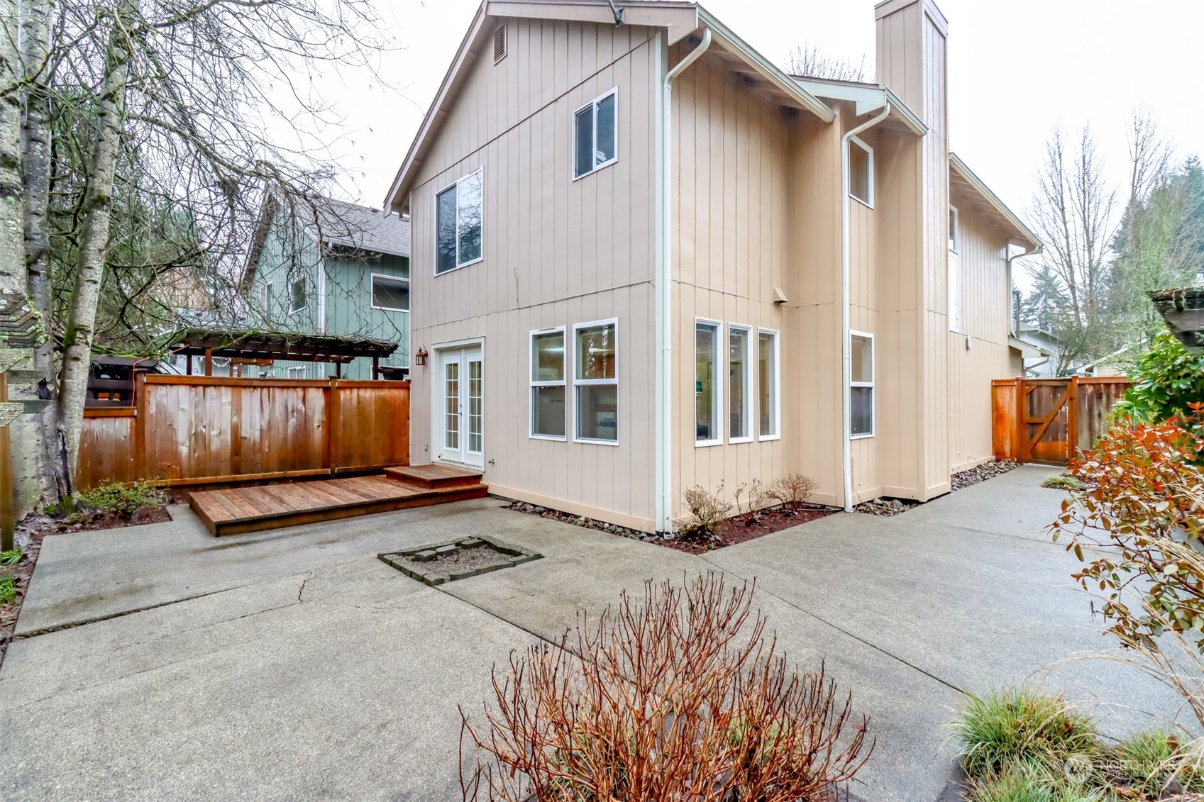 4566 Beckonridge Loop Southeast Lacey, WA 98513 - Photo 32 of 37 a view of a house with a yard