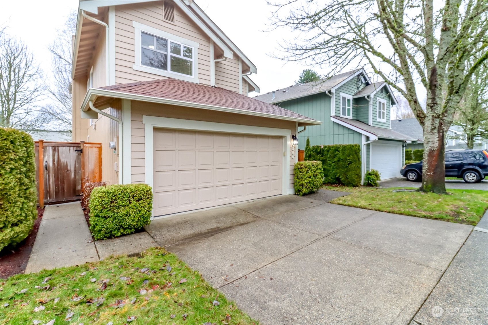 4566 Beckonridge Loop Southeast Lacey, WA 98513 - Photo 37 of 37 a front view of a house with garden