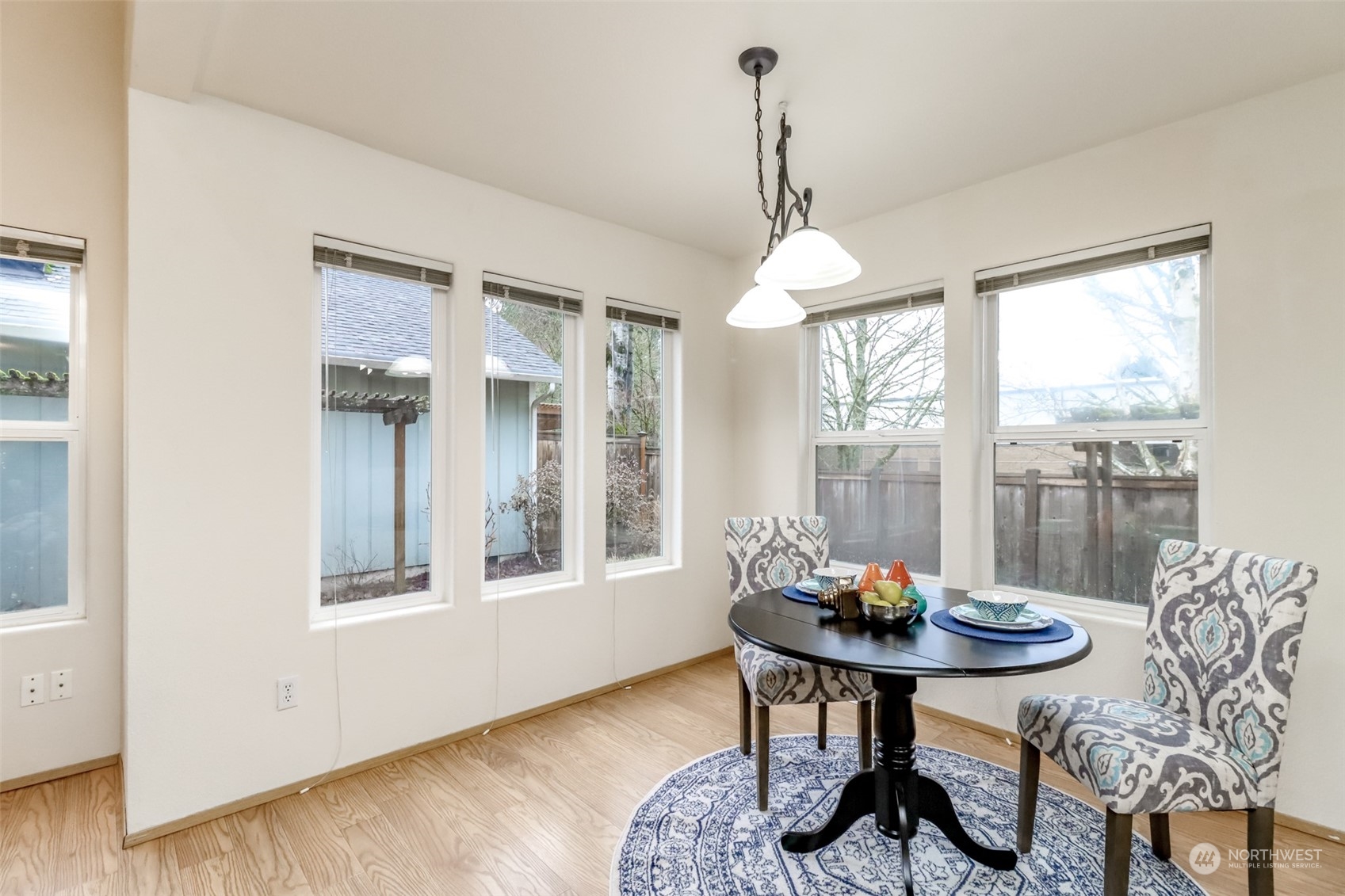 4566 Beckonridge Loop Southeast Lacey, WA 98513 - Photo 8 of 37 a view of a dining room with furniture window and outside view