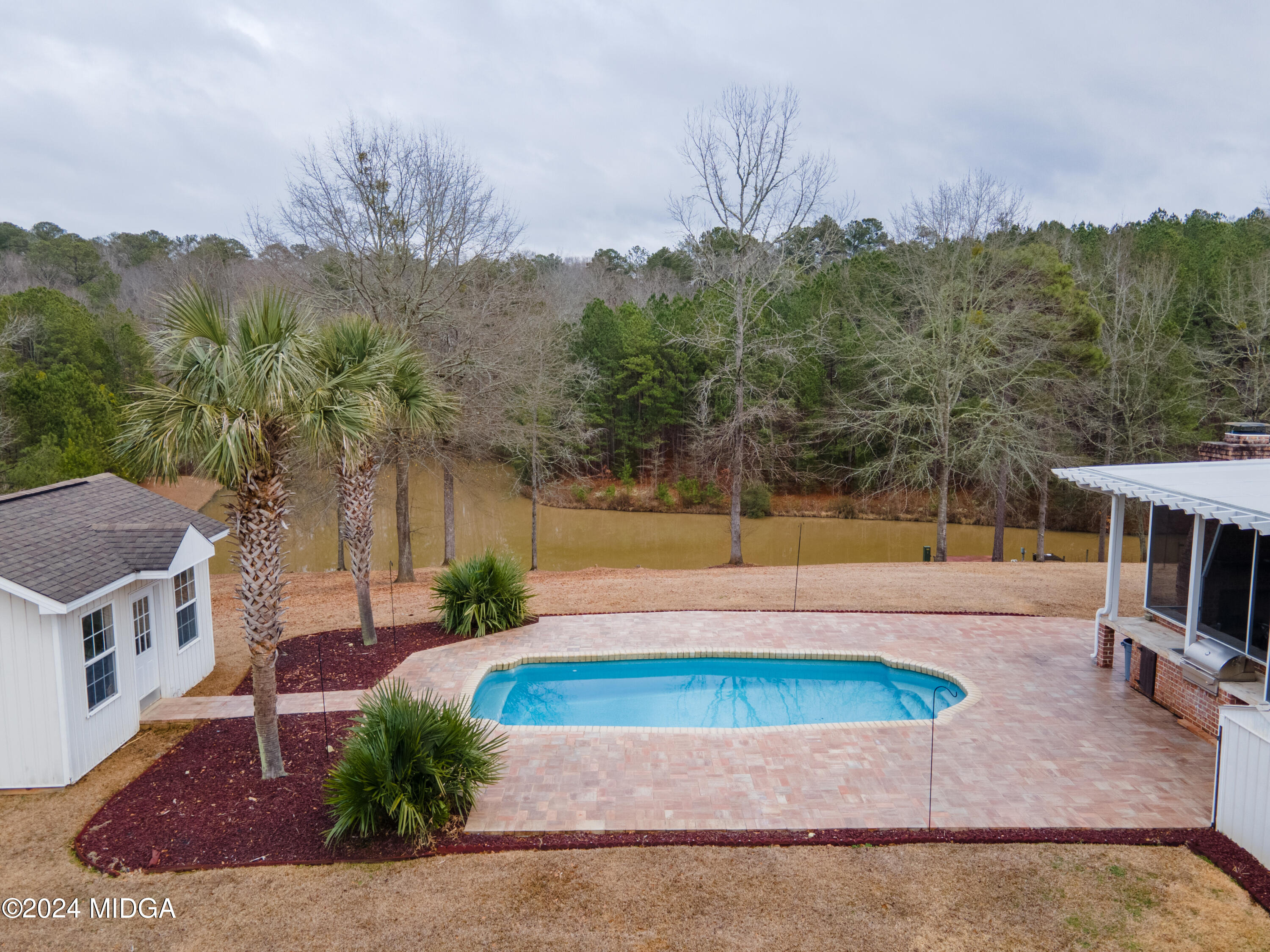 1298 Head Road Juliette, GA 31046 - Photo 69 of 90 a view of a swimming pool with a patio