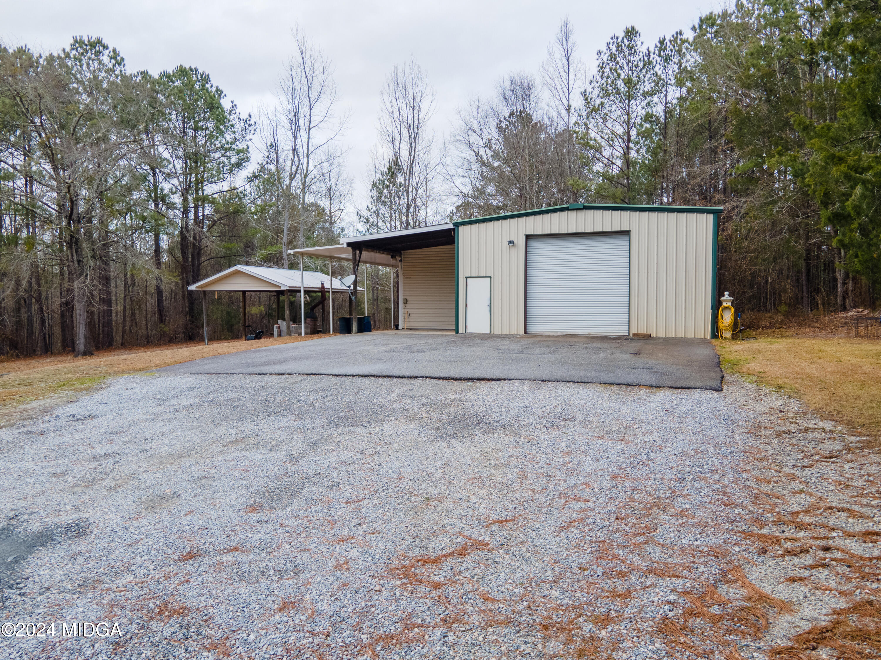 1298 Head Road Juliette, GA 31046 - Photo 76 of 90 a house with trees in the background