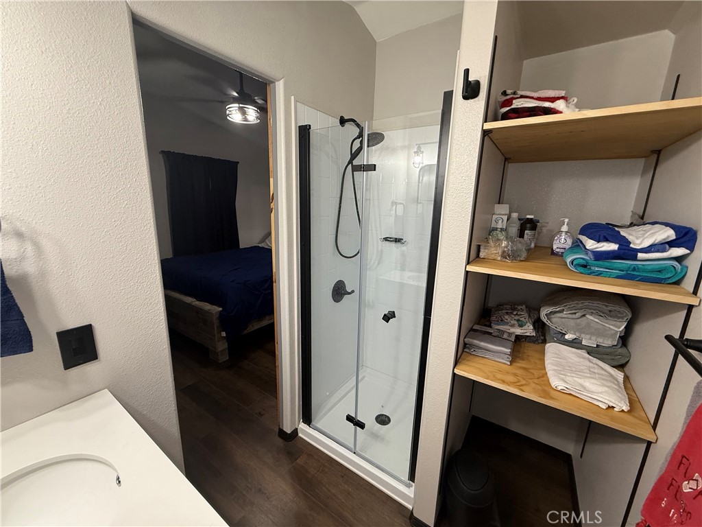50918 Parker Dam Road, Unit 121 Earp, CA 92242 - Photo 15 of 24 a bathroom with a sink and a mirror