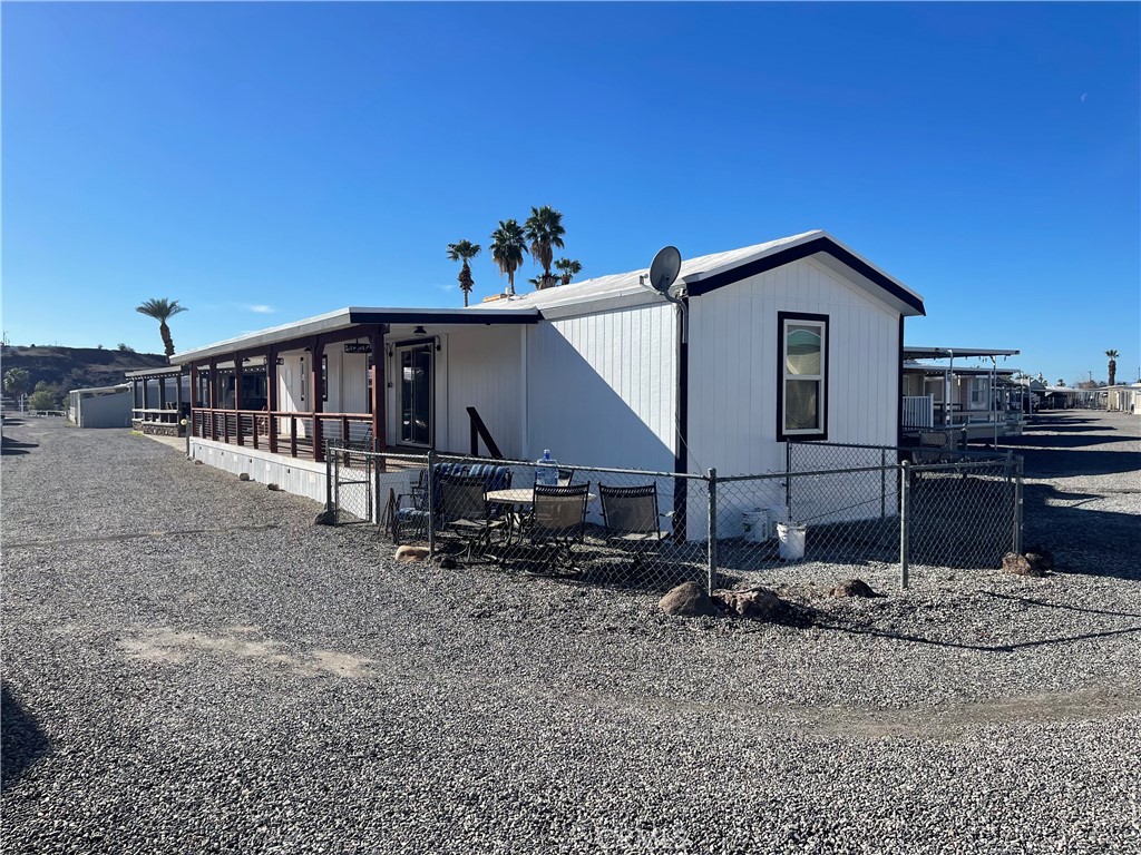 50918 Parker Dam Road, Unit 121 Earp, CA 92242 - Photo 2 of 24 a view of a house with a yard