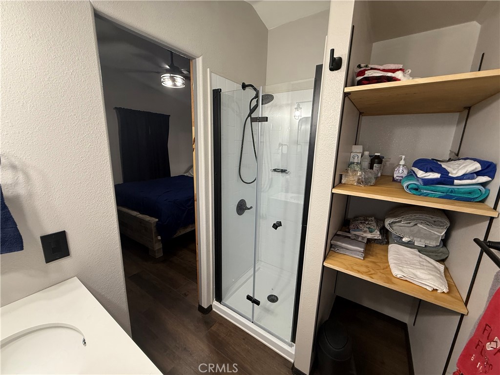 50918 Parker Dam Road, Unit 121 Earp, CA 92242 - Photo 23 of 24 a bathroom with a sink toilet and shower