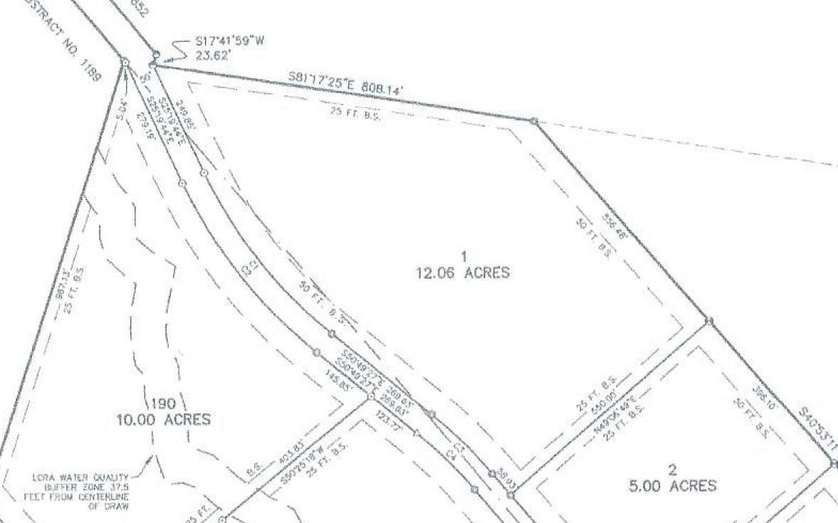Saddle Ridge Dr Drive Bertram, TX 78605 - Photo 13 of 14 a bathroom with a shower and a shower