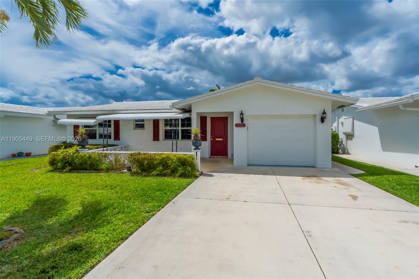 1005 Southwest 18th Street Boynton Beach, FL 33426 - Photo 36 of 44 a view of outdoor space yard and deck