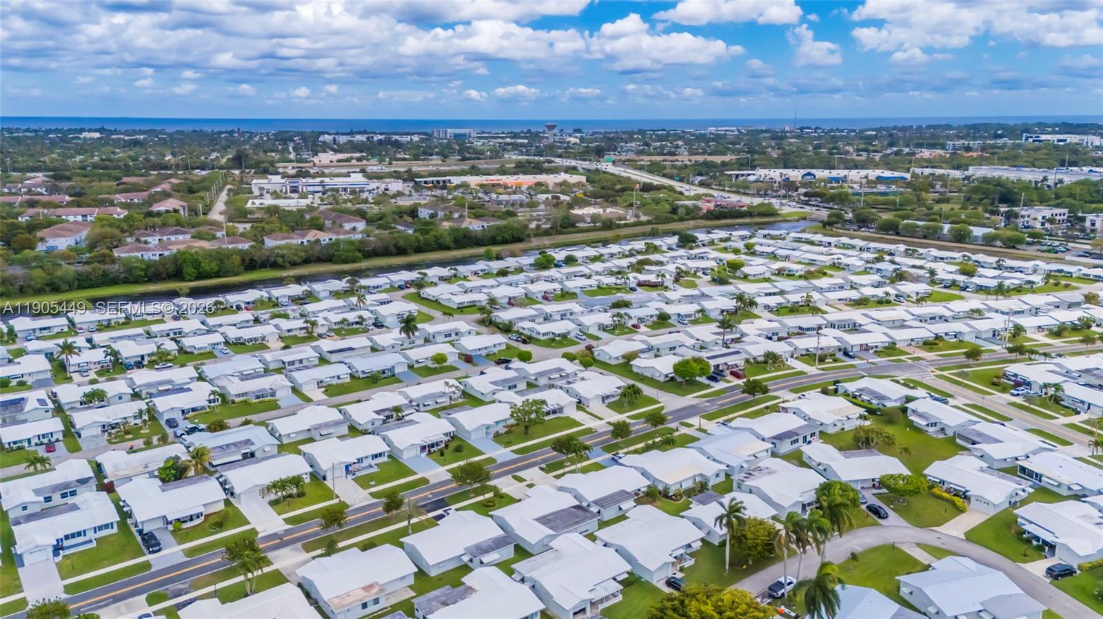 1005 Southwest 18th Street Boynton Beach, FL 33426 - Photo 42 of 44 an aerial view of residential houses with outdoor space